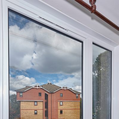 White uPVC Reversible window installation